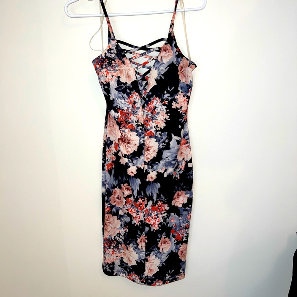 Medium sized tight floral dress. Only worn once!